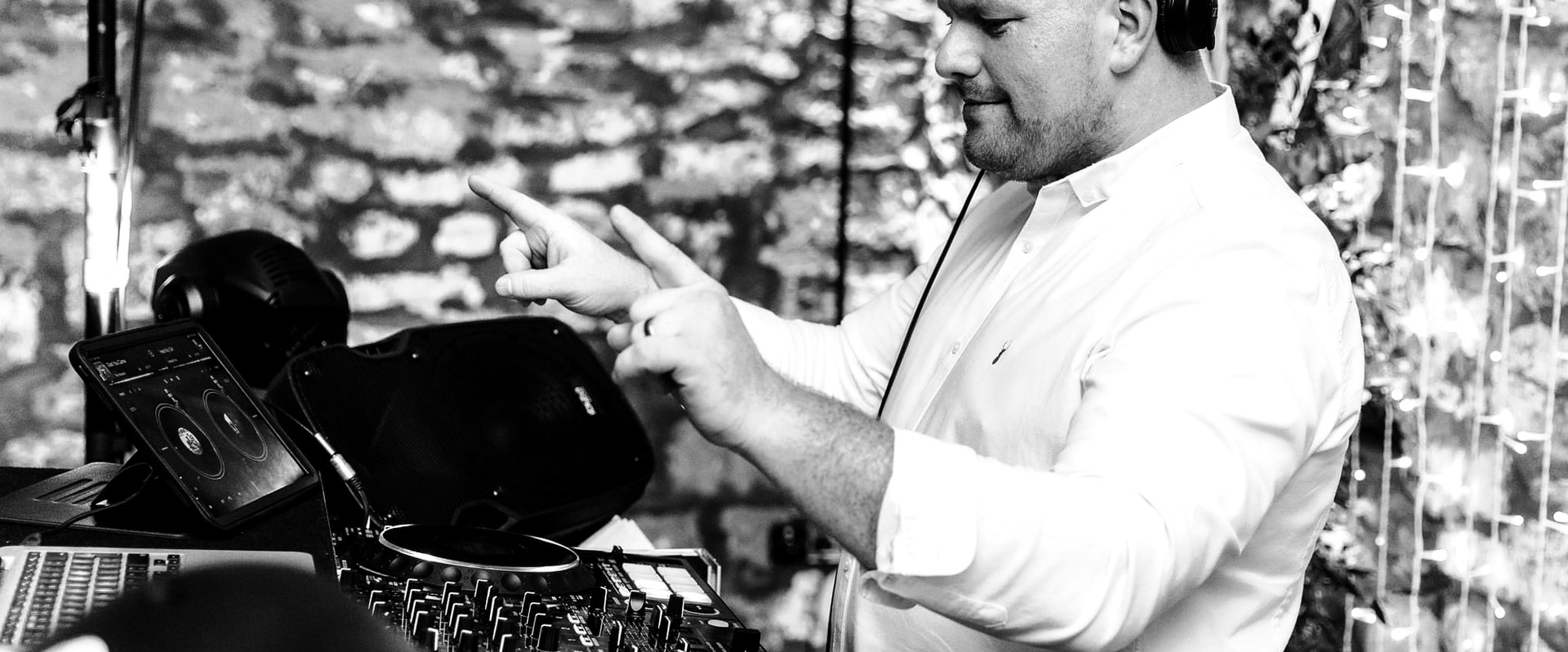 Jon Kane mixing music at a wedding